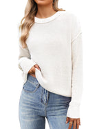 Women's black cropped knit sweater with crew neck and long sleeves