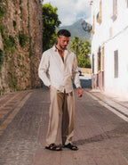 Men's white and taupe striped oversized shirt with open collar and long sleeves