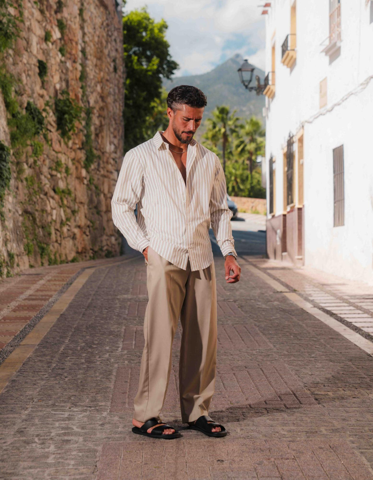 Men's white and taupe striped oversized shirt with open collar and long sleeves