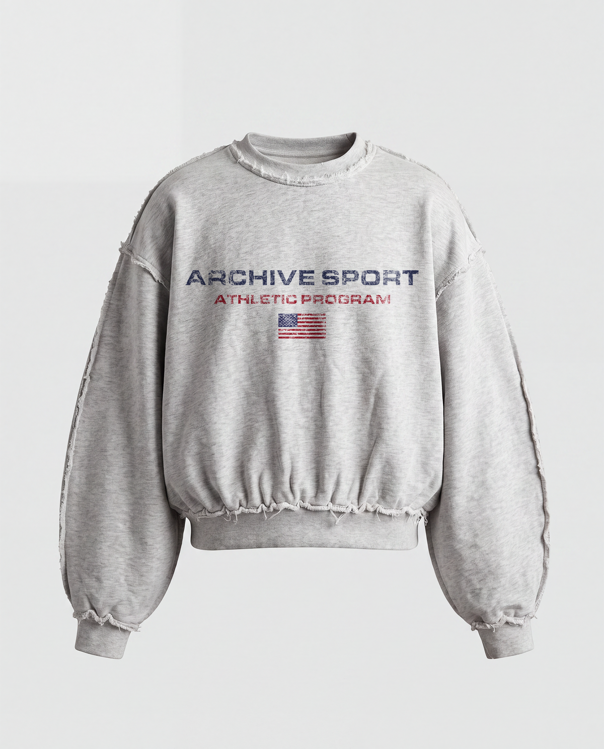 Grey cropped crew neck sweatshirt with long sleeves, distressed trims and USA sports graphic