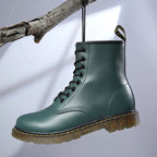 Women's lace-up combat boots with chunky ridged soles