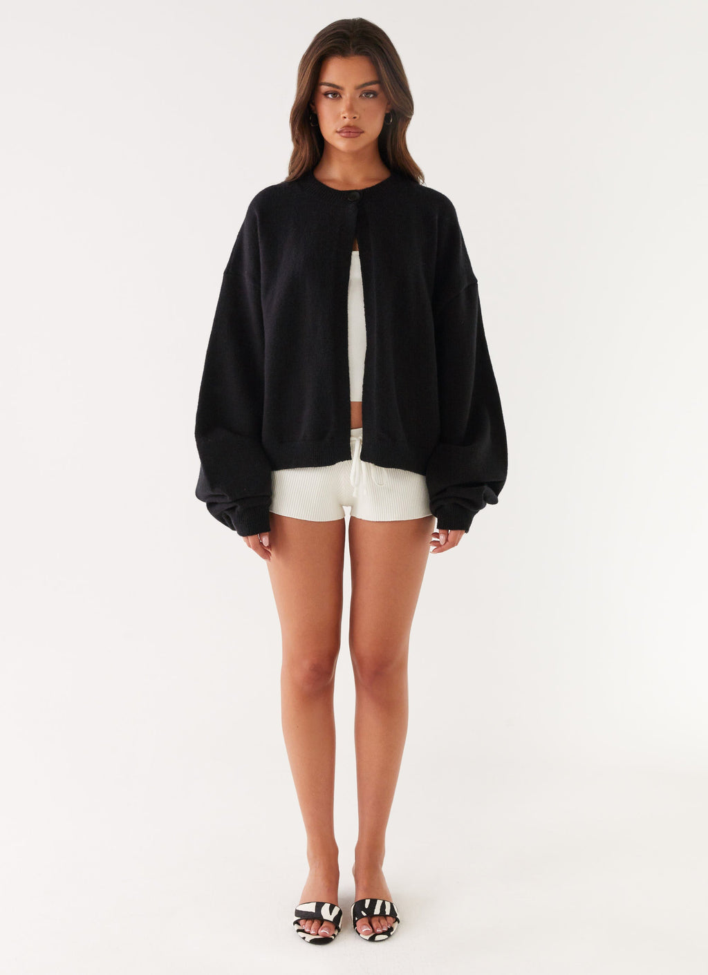 Women's black cardigan with one button and long sleeves
