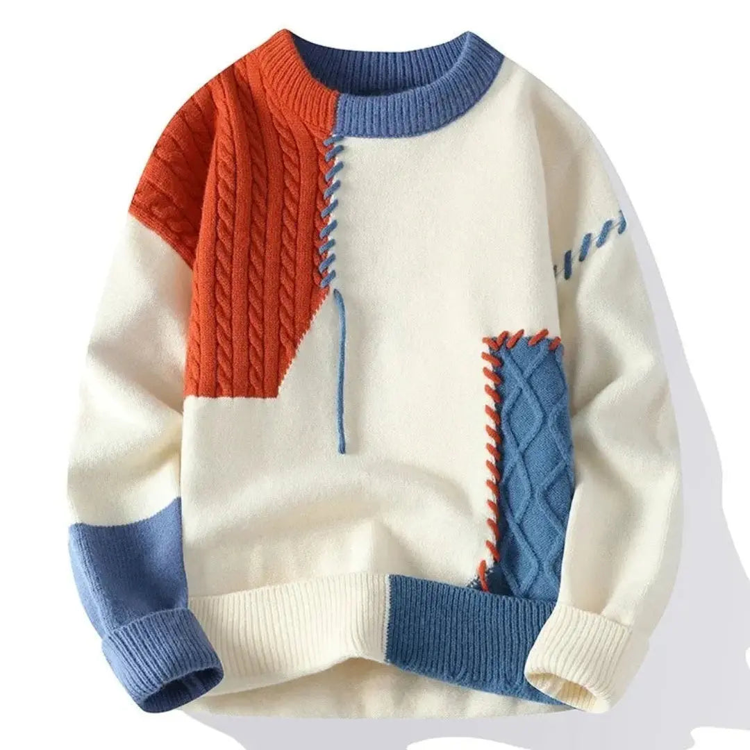 Patchwork cable knit sweater with crew neck and long sleeves