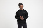 Unisex crew neck sweatshirt with long sleeves and contrasting chest logo