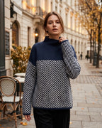 Women's relaxed turtleneck jumper with contrasting chevron knit pattern