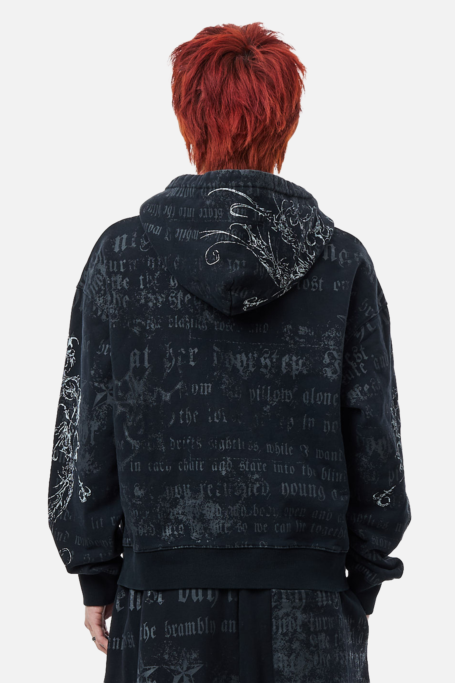Men's black hooded zip hoodie with text and ornamental graphics