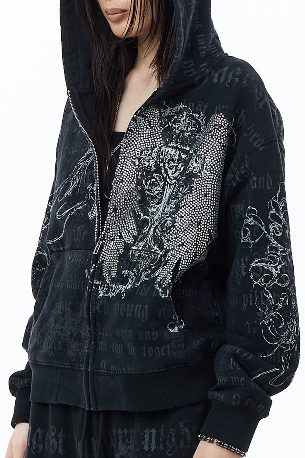 Men's black hooded zip hoodie with text and ornamental graphics