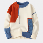 Unisex patchwork cable knit sweater with contrasting panels