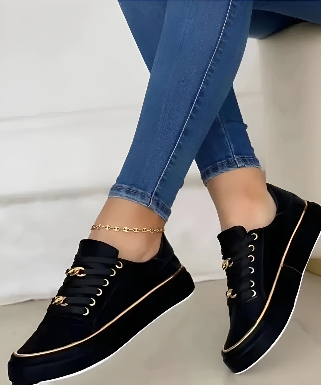 Women's lace-up platform sneakers with gold-tone chain detail