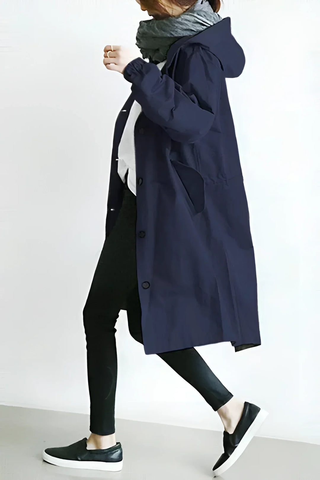 Women's long hooded trench coat with button front and elasticated cuffs