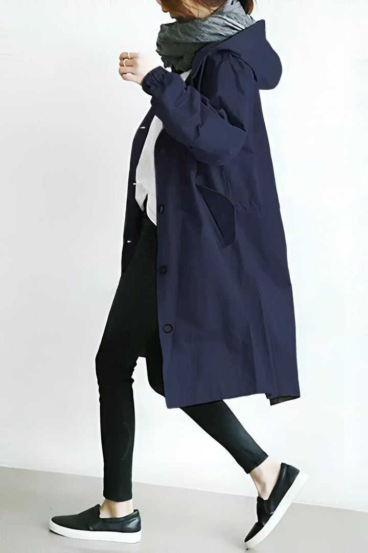 Women's long hooded trench coat with button front and elasticated cuffs