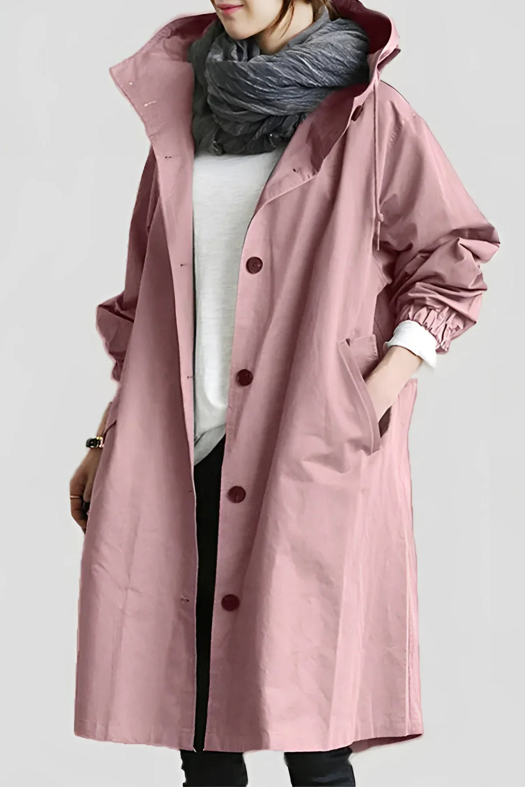 Women's long hooded trench coat with button front and elasticated cuffs