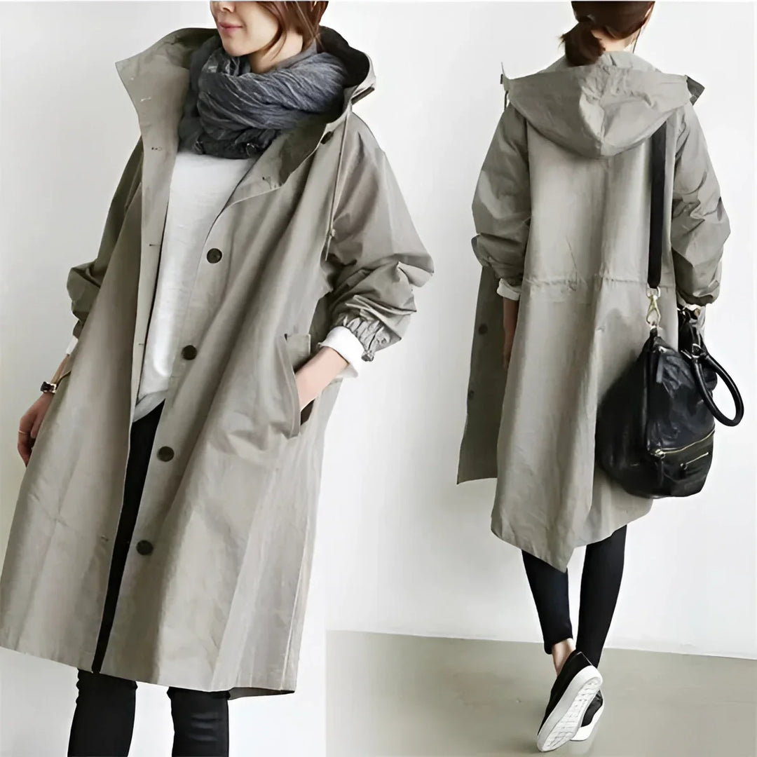 Women's long hooded trench coat with button front and elasticated cuffs