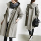 Women's long hooded trench coat with button front and elasticated cuffs