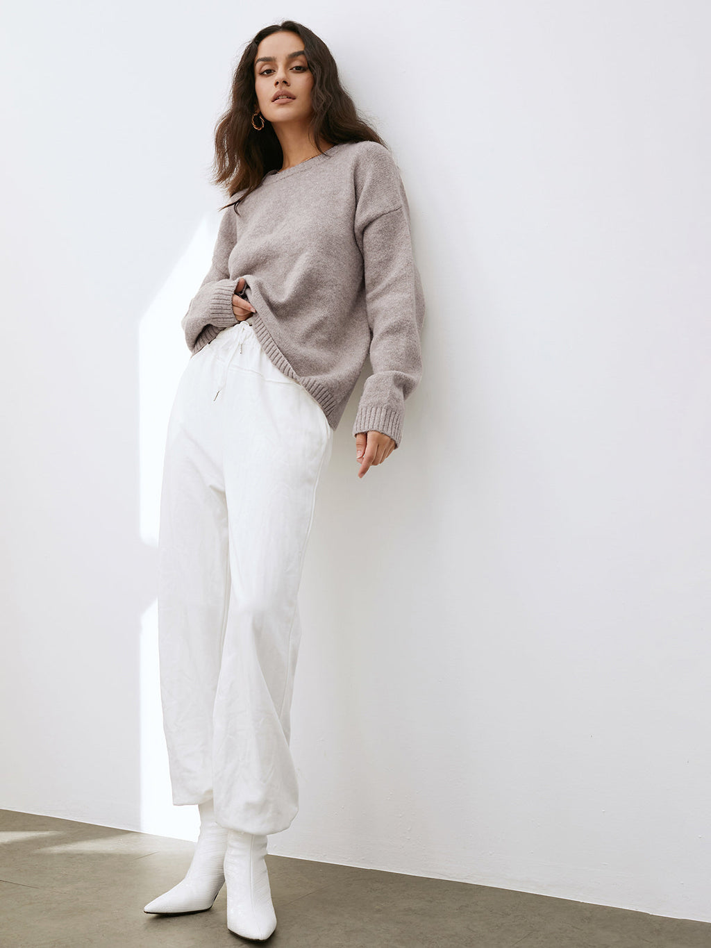 Women's camel crew neck jumper with long sleeves and ribbed trims