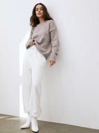 Women's camel crew neck jumper with long sleeves and ribbed trims
