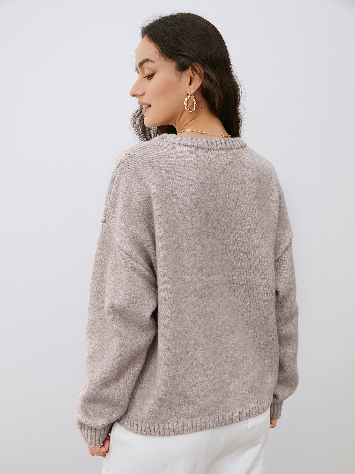 Women's camel crew neck jumper with long sleeves and ribbed trims