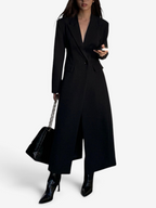 Women's long black tailored coat with lapels and one-button closure