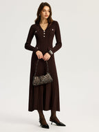 Women's dark brown ribbed maxi dress with V-neck collar and long sleeves