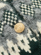 Green Fair Isle short-sleeve cardigan with crew neck and button front