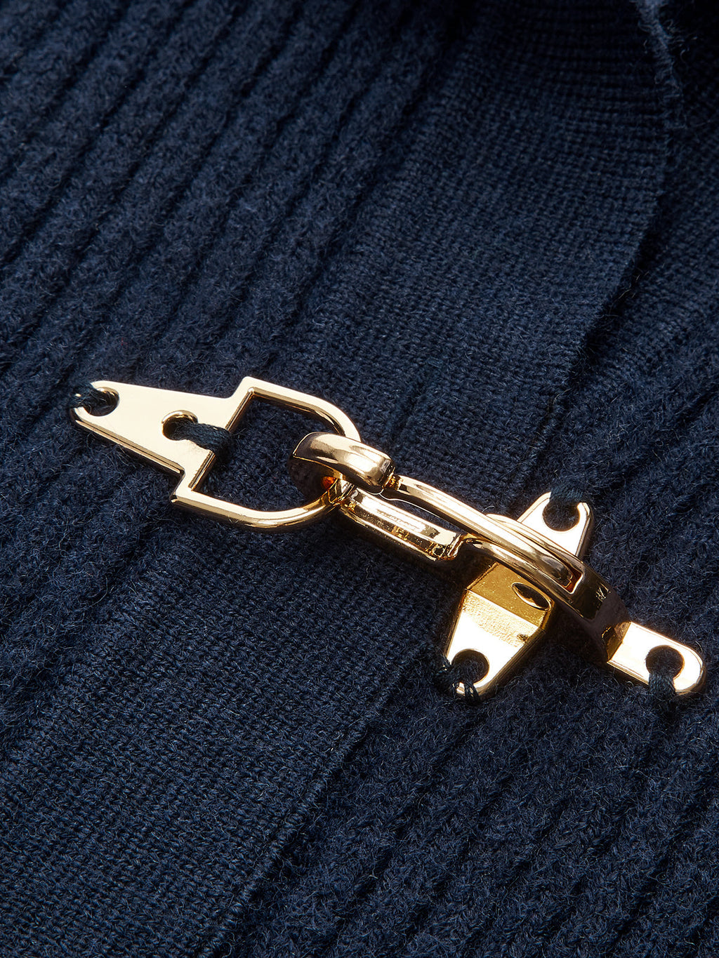 Women's cropped ribbed sweater with collar and metal buckle fastenings