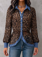 Women's leopard print blouse with blue contrast trim and long sleeves