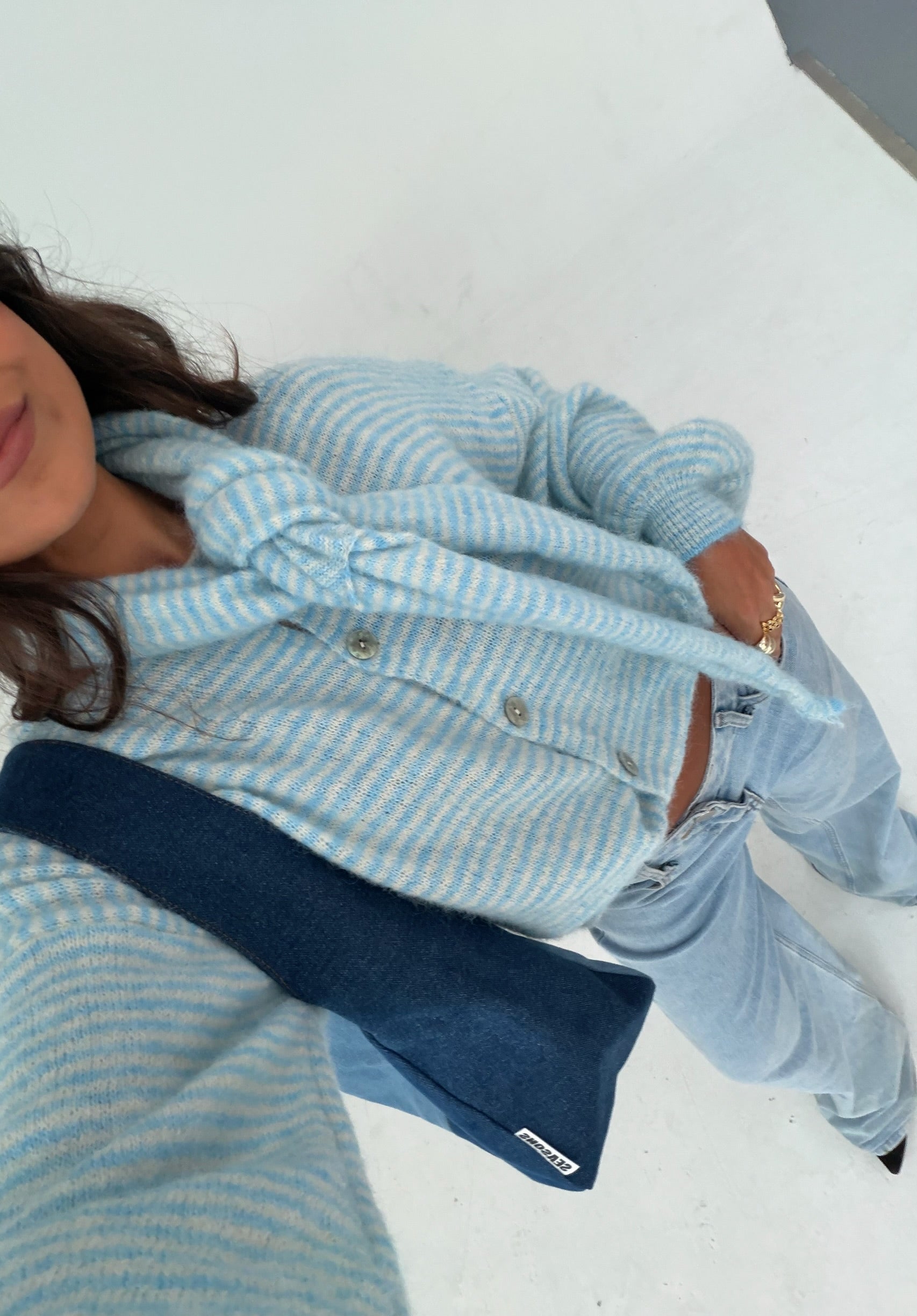 Women's blue striped cardigan with matching scarf