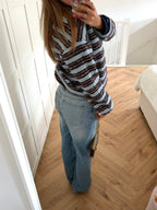 Women's textured striped sweater with collared V-neck and long sleeves