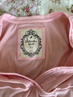Women's wrap babydoll top with long sleeves and waist ties