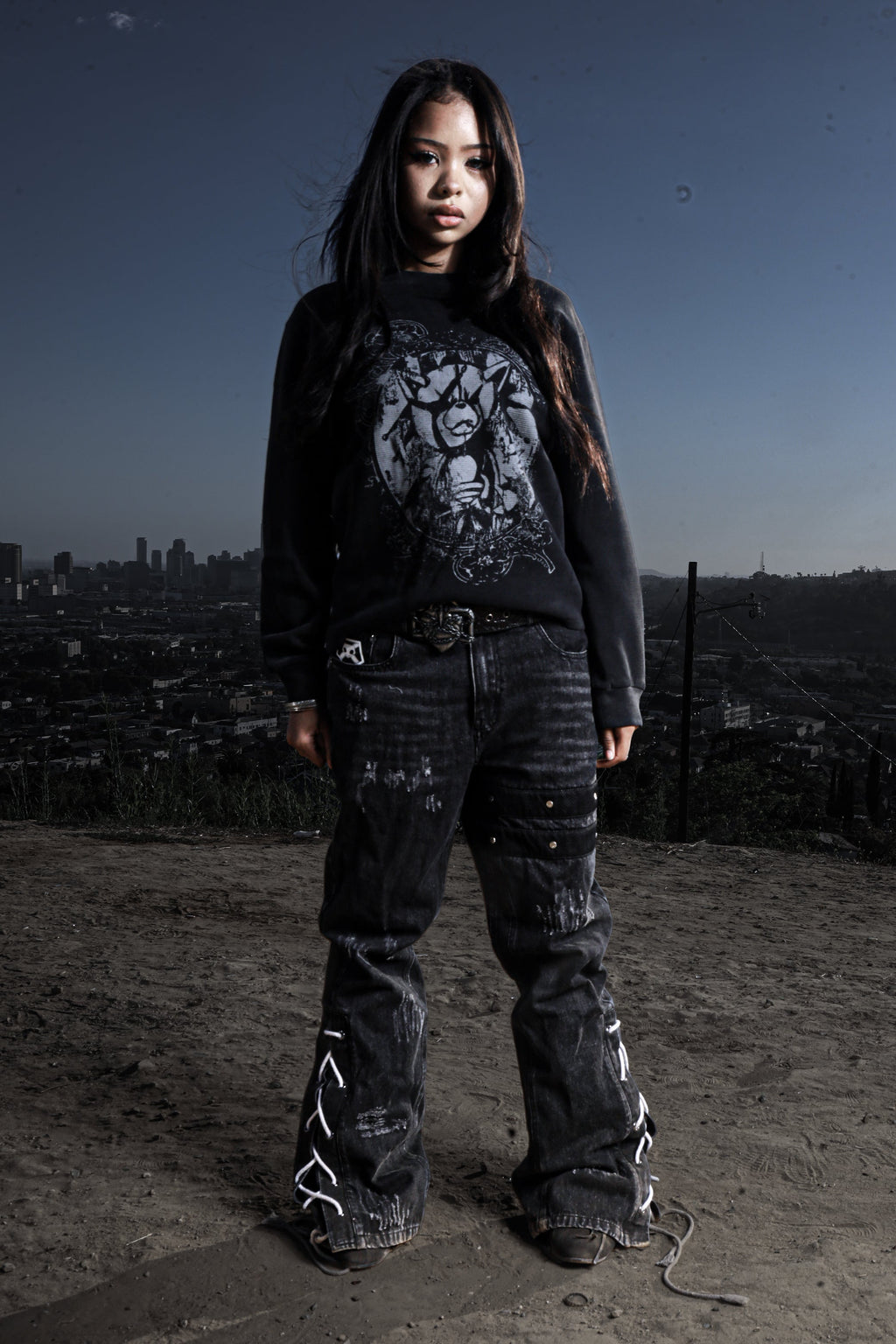 Women's black crewneck sweatshirt with monochrome graphic front print
