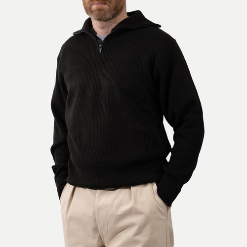 Men's black ribbed half-zip sweater with high collar