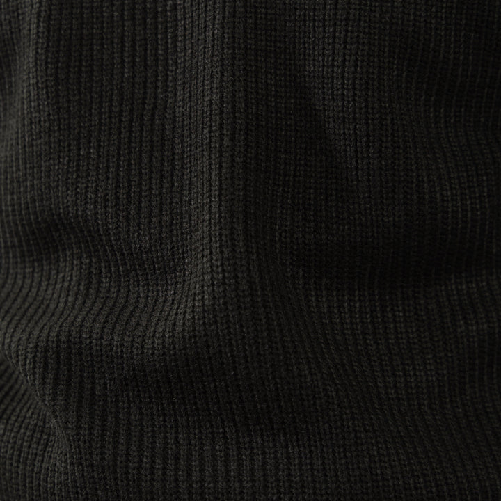 Men's black ribbed half-zip sweater with high collar