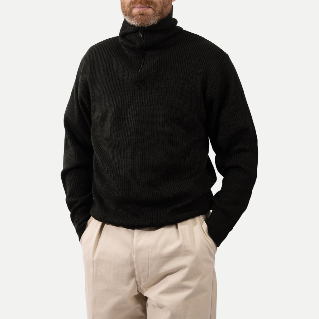 Men's black ribbed half-zip sweater with high collar