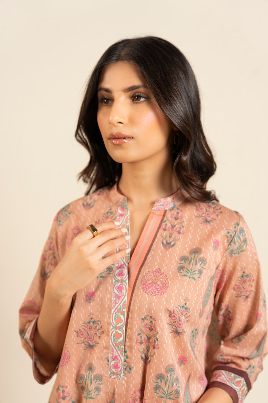 Women's peach floral shirt and trouser set with mandarin collar and patterned trims
