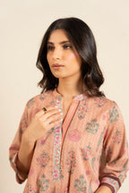Women's peach floral shirt and trouser set with mandarin collar and patterned trims