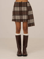 Women's brown plaid mini skirt with high waist and fringed hem