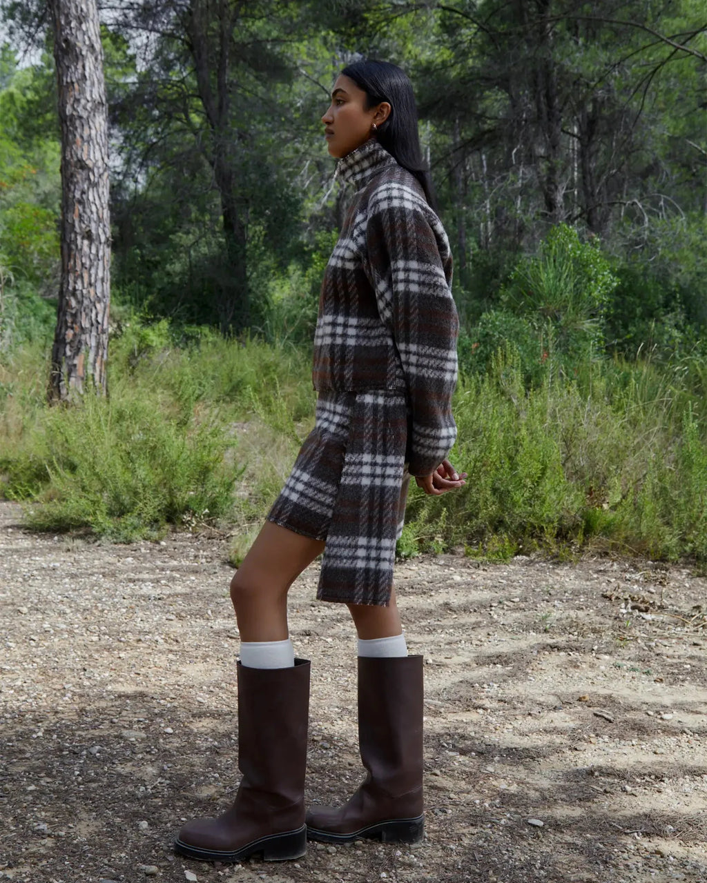 Women's brown plaid cropped turtleneck top with long sleeves and fringed edges