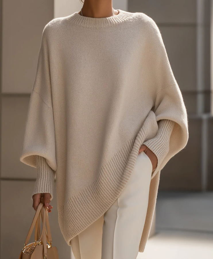 Oversized knit sweater with crew neckline and long sleeves