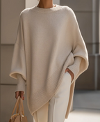 Oversized knit sweater with crew neckline and long sleeves
