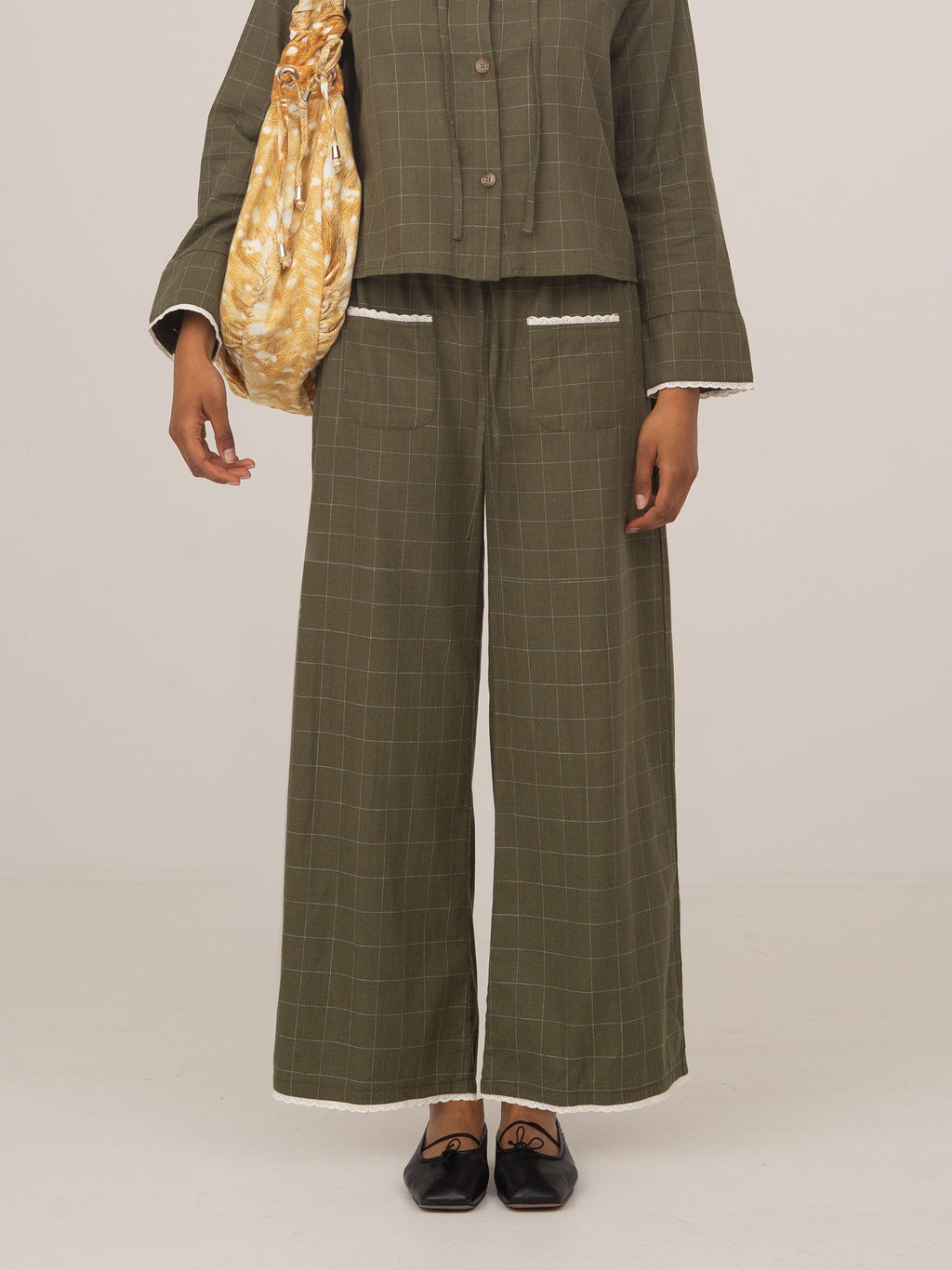 Women's green plaid wide leg trousers with drawstring waist and trim
