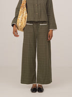 Women's green plaid wide leg trousers with drawstring waist and trim