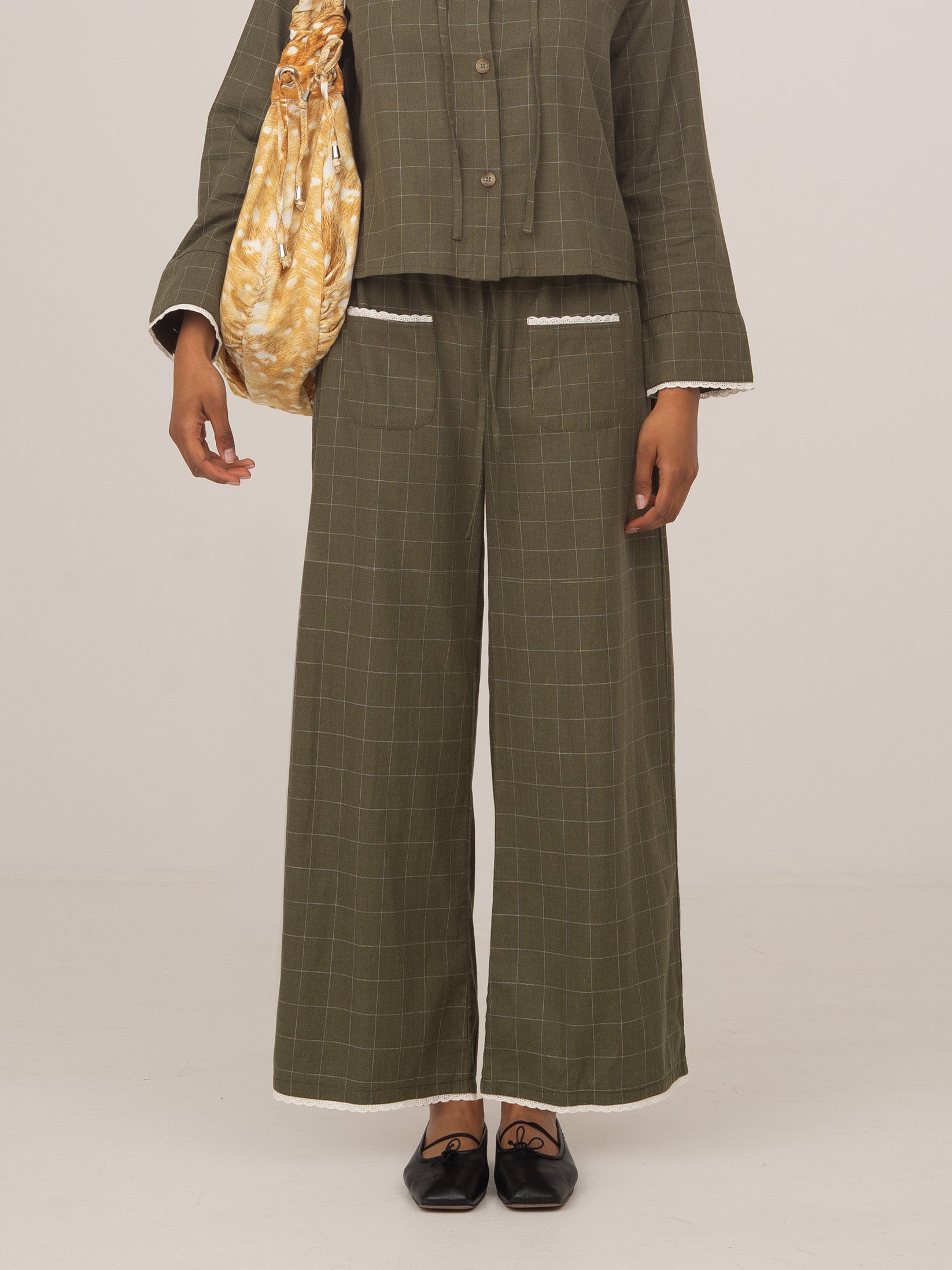 Women's green plaid wide leg trousers with drawstring waist and trim