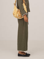 Women's green plaid wide leg trousers with drawstring waist and trim