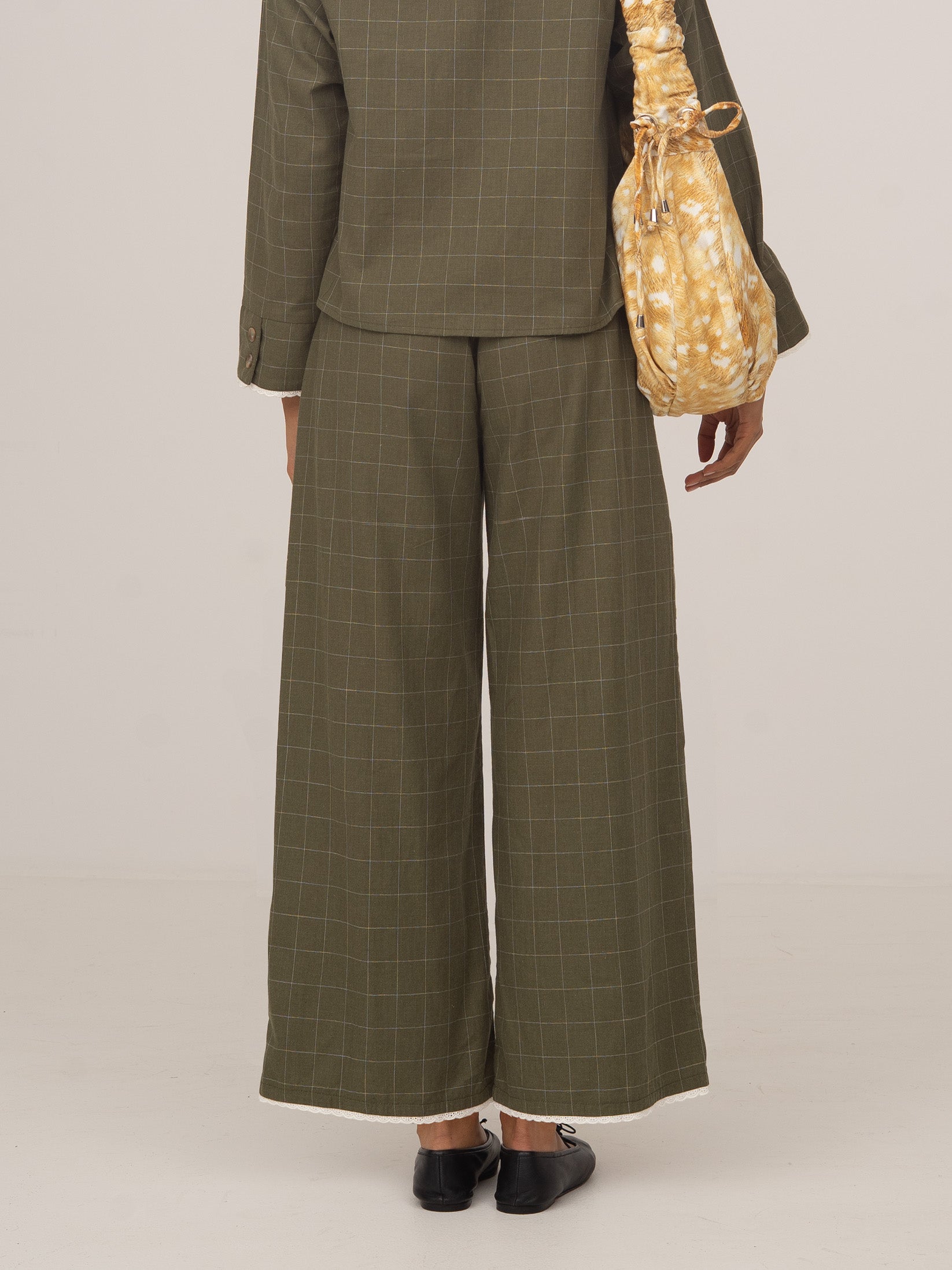Women's green plaid wide leg trousers with drawstring waist and trim