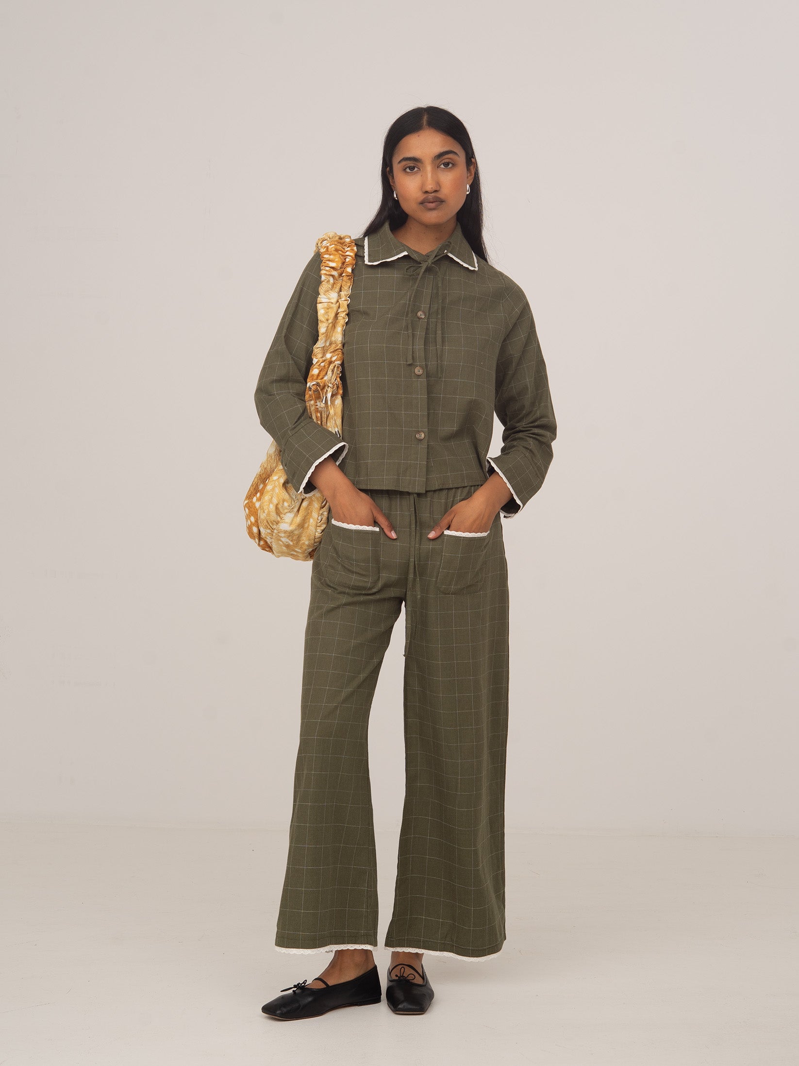 Women's green plaid wide leg trousers with drawstring waist and trim