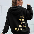 Women's oversized hooded sweatshirt with contrasting text graphic on the back