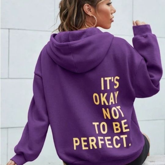 Women's oversized hooded sweatshirt with contrasting text graphic on the back
