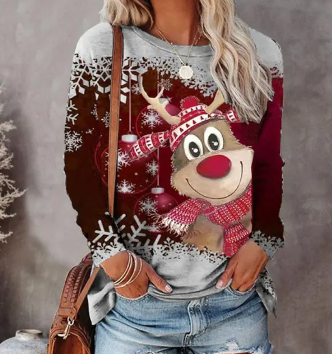 Women's Christmas jumper with reindeer and snowflake graphic