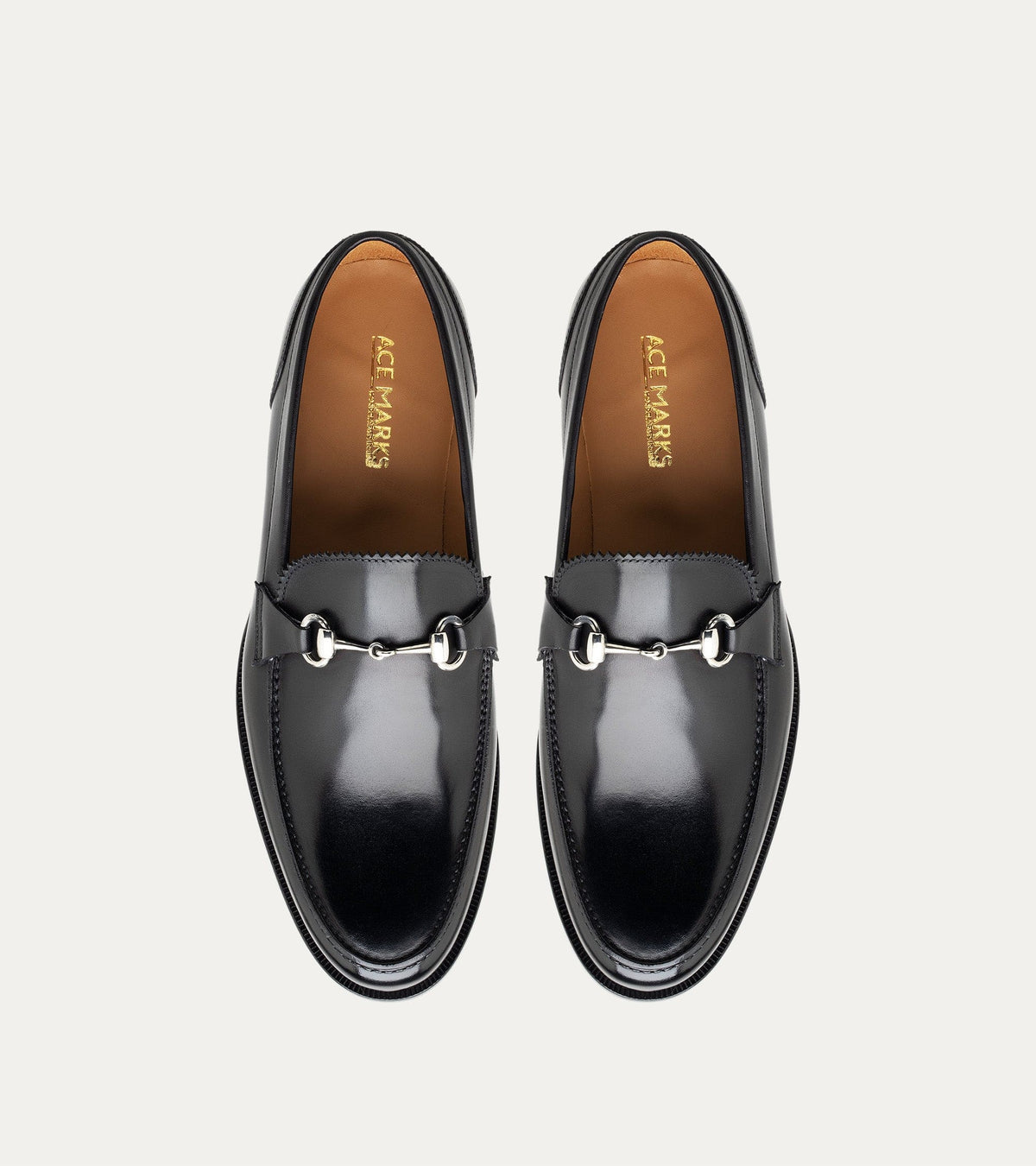 Men's black slip-on bit loafer with square toe and low heel