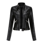 Women's fitted faux leather biker jacket with stand collar, long sleeves and zipped pockets